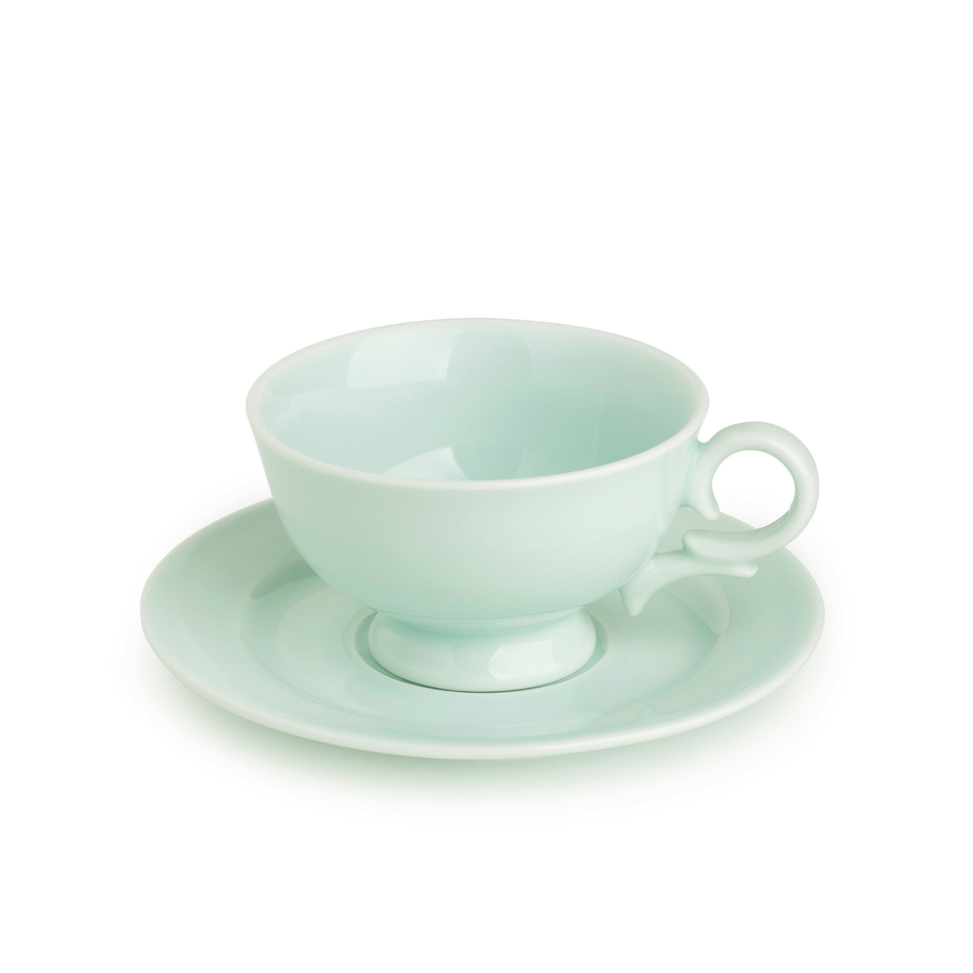 Green celadon porcelain coffee cup and saucer set, 30 degree angle view, media 1 of 4