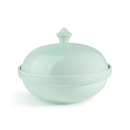 10" green celadon porcelain serving bowl with cover, cover on top, angle view, media 3 of 5